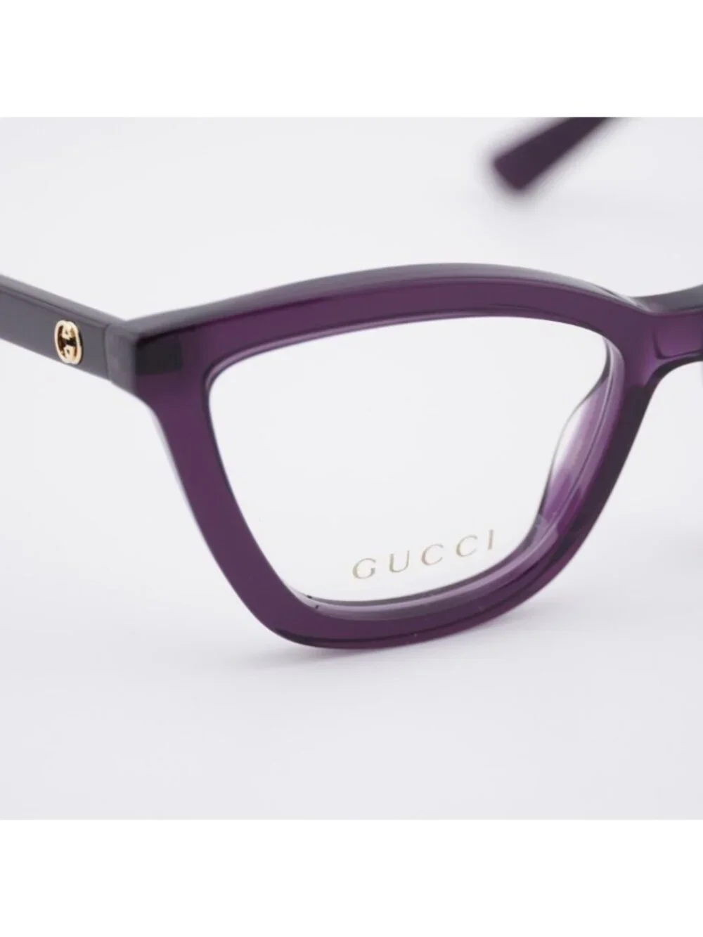 Gucci GG1686O 011 Eyeglasses Shiny Transparent Dark Purple 54mm Cat Eye Frame